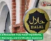 Halal restaurant sign on a brick building showing certified halal emblem, highlighting standards and clean preparation safely